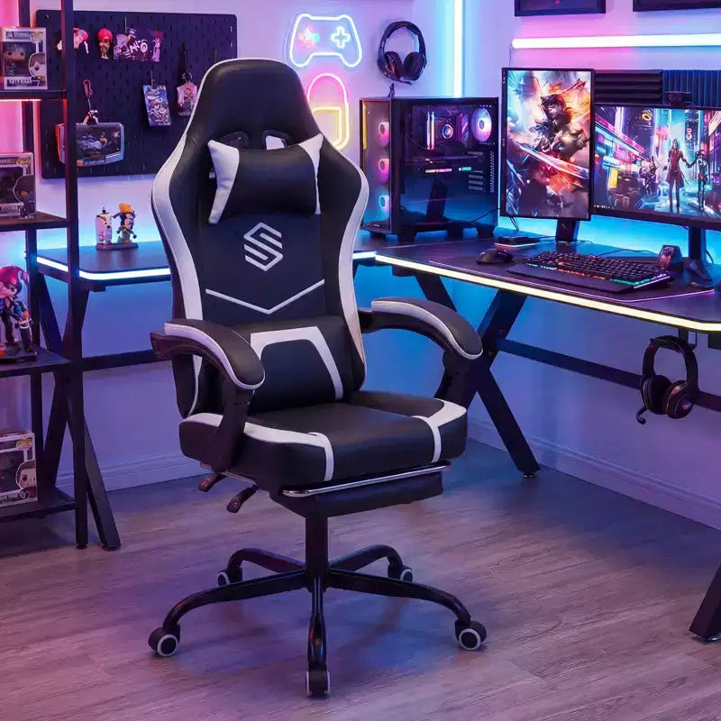 Fauteuil de jeu avec appuie-tête, support lombaire, accoudoirs liés et dossier réglable.